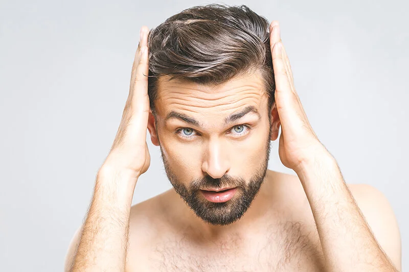 Kann Minoxidil bei meinem Haaransatz helfen?